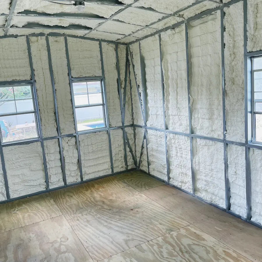 Closed-cell spray foam insulation applied to wall cavities in a residential project in Beaverton